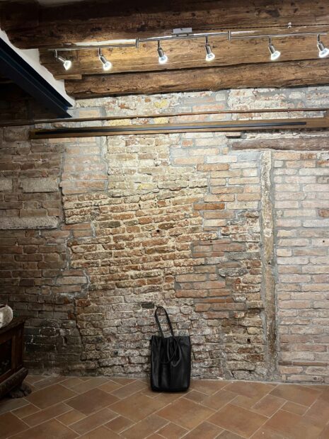 Crooked bricks in a studio wall