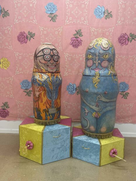 Large scale nesting dolls of artists Chuck and George