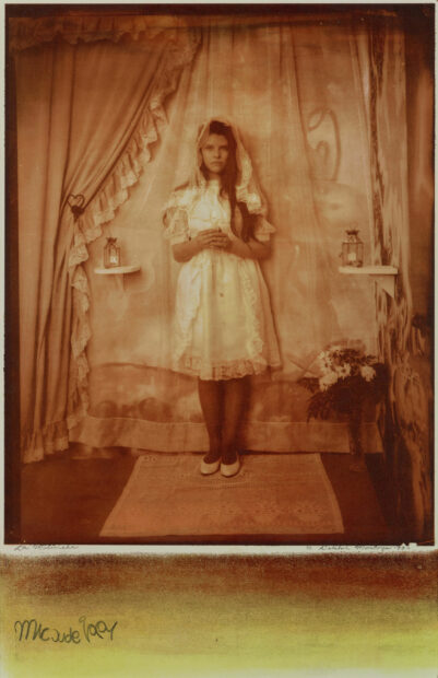 Image of a young woman in a communion dress