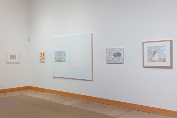 Installation view of works on canvas on a wall