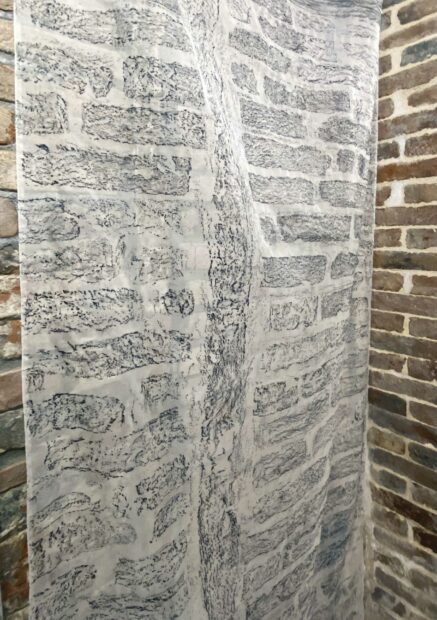 Brick tracing on white silk