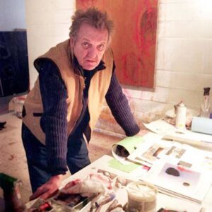 A photograph of artist Tony Magar in his studio.
