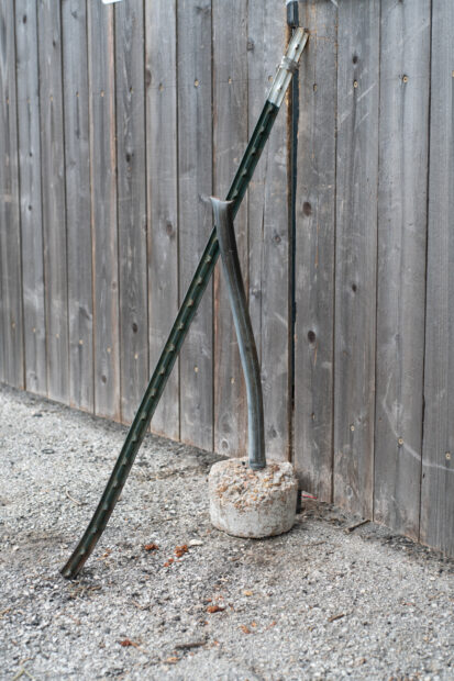 Rebar, a picket fence, and cement