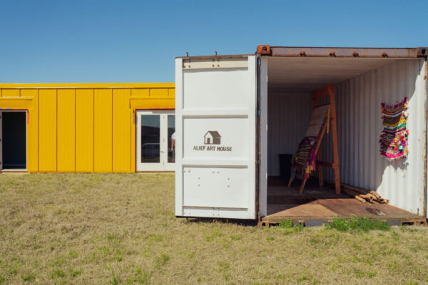 A photograph of shipping container buildings.