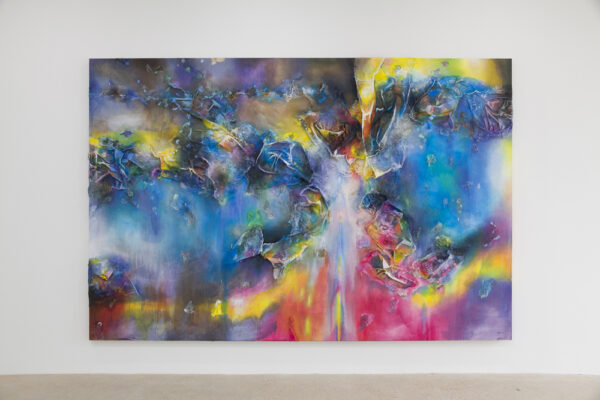 A photograph of a large mixed media work with vibrant swirling colors.