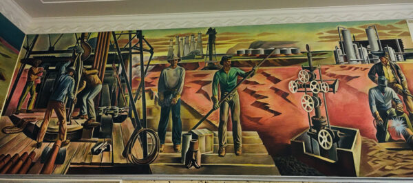 Photo of a mural depicting the oil industry