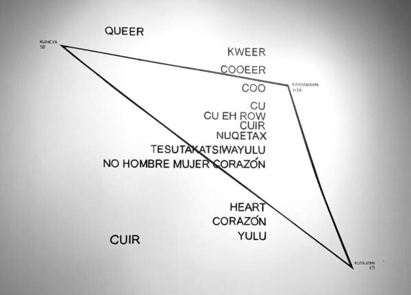 An artwork featuring a triangle drawn on a wall. The triangle is filled with words in many different languages.
