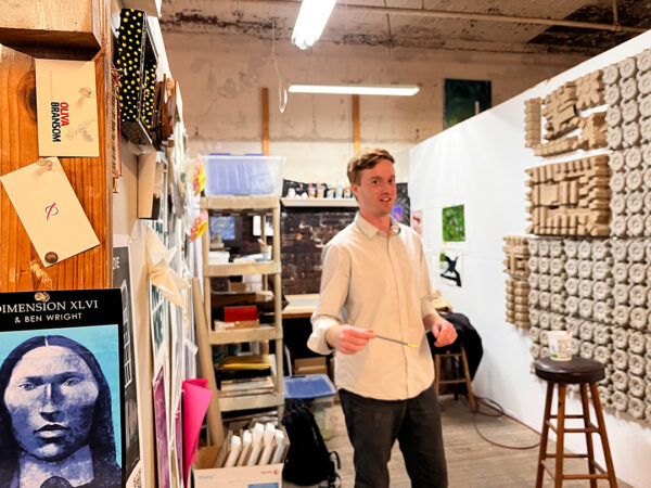 A photograph of Clay Reuter in his studio.