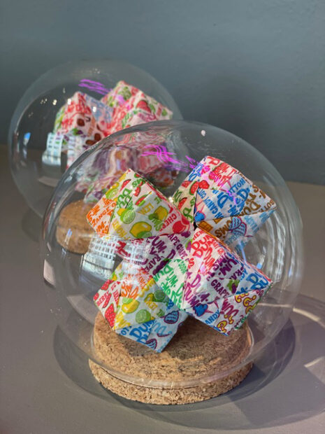 Photo of candies in an upside down candy jar