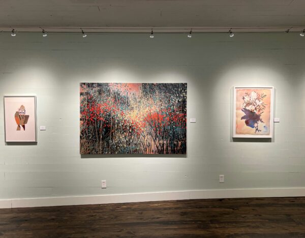 Two dimensional, abstract works on paper and canvas on a wall