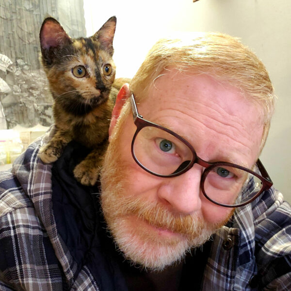 Portrait of the artist with a cat on his shoulder