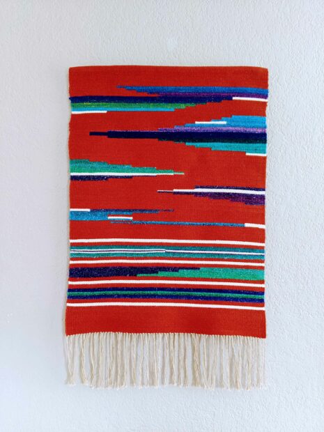 Red, green, blue and purple sarape with tassels