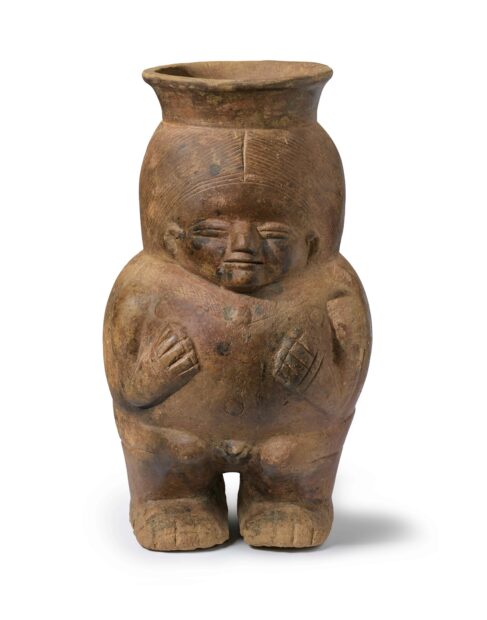 Terra cotta female figurine carved into a vase