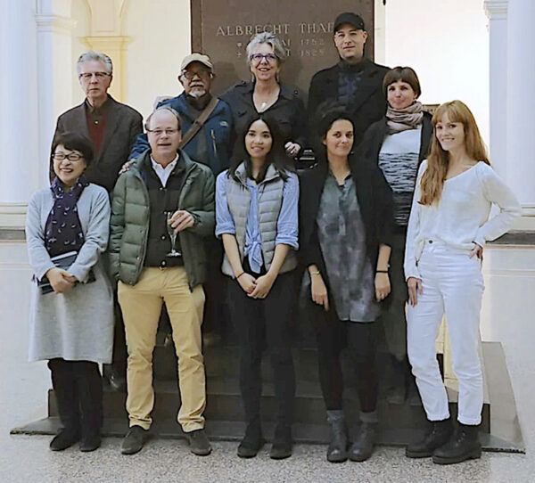 Photo of the artist with students
