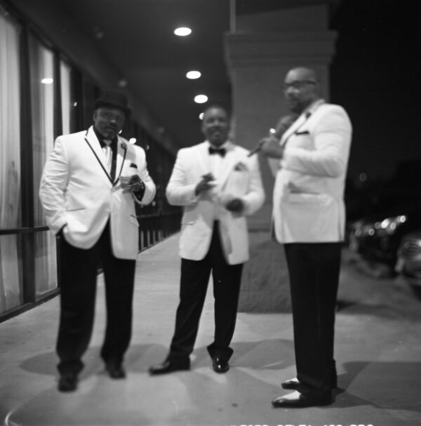 Photo of three men in suits