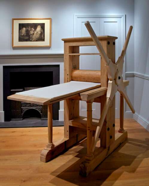 A photograph of a replica of William Blake’s printing press.