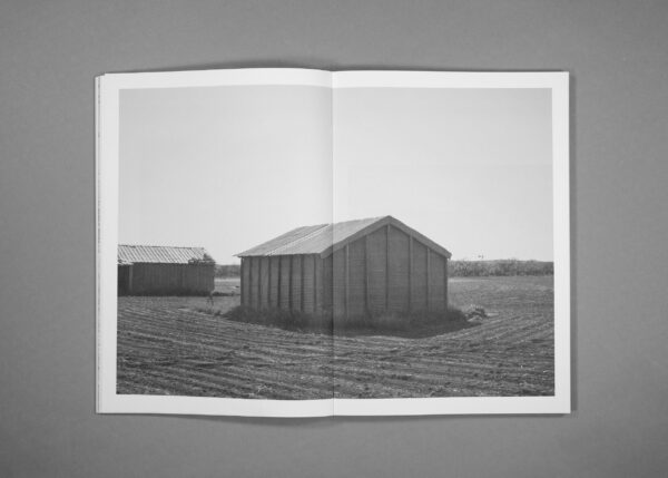 Image of a barn in an empty field