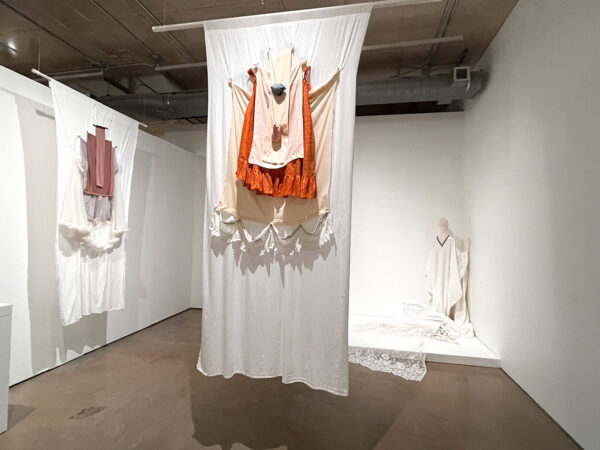 An installation image of fabric works by Christian Cruz.