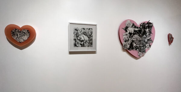 An installation image of four small mixed media works by Christopher Nájera Estrada.