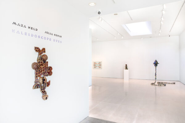 Installation view of an exhibition of works on paper and sculptural works in a white cube space