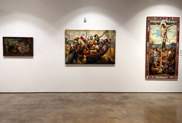 An installation image of three paintings by Patrick McGrath Muñiz.