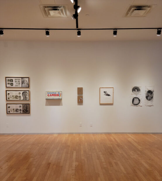 Installation view of two dimensional works on the wall