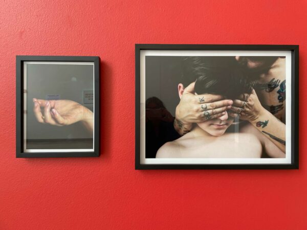 A photo of a hand on the right and on the left a photo of a woman covering a child's eyes