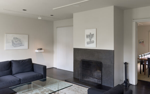 Installation view of works on the wall in a living room space