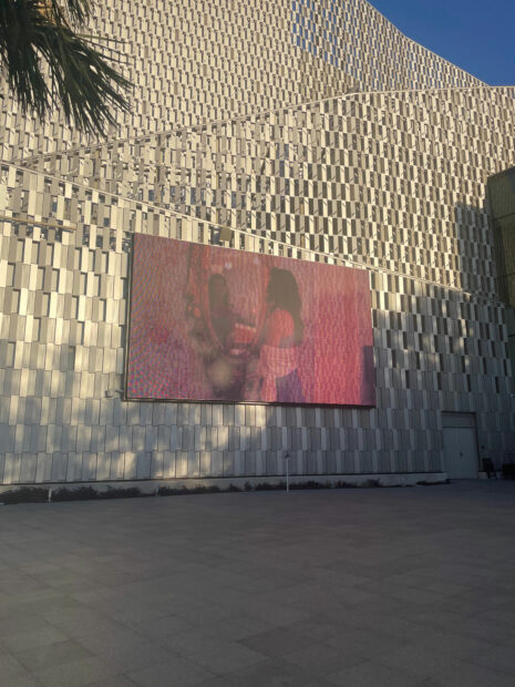 Photo of a video on an LED Screen on the side of the Tobin Center wall