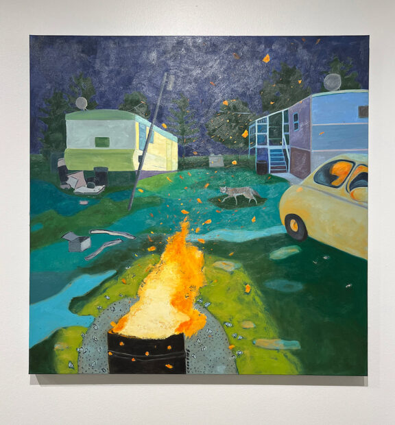 A painting by Lindy Chambers of an outdoor fire at night near a mobile home neighborhood. 
