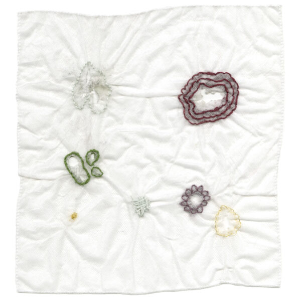 White handkerchief embroidered with colored embroidery floss