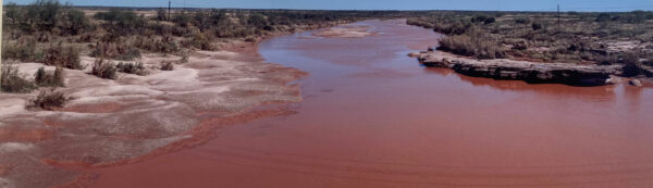 Photo of the red river during a flash flood