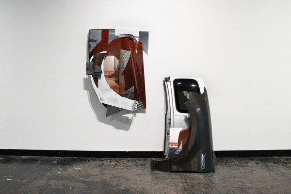 Family portraits are interspersed amongst fragments of a Ford-150 that have been arranged into two sculptural forms, one of which is hung on a wall, and the other of which stands upright on the ground.