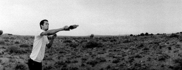 Photo of a man in a desert field