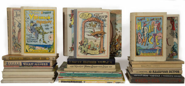 A photograph of stacks of children's books from the 1960s illustrated by artist Ilya Kabakov.