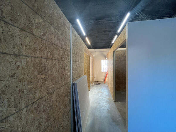 A photograph of the inside of a future artist studio space.