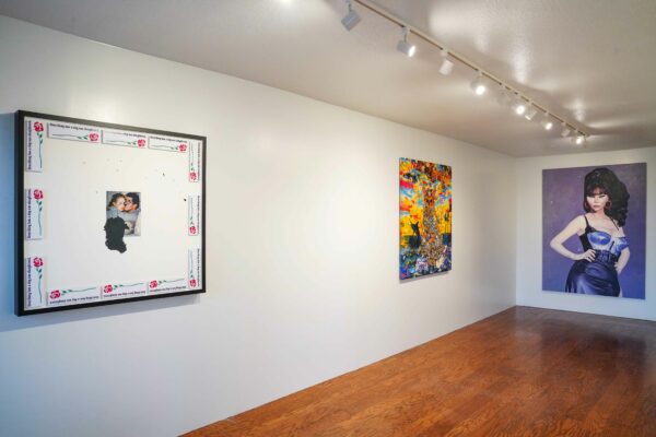 Installation view of three paintings in a gallery