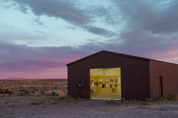 Photo of an installation in a barn in the desert