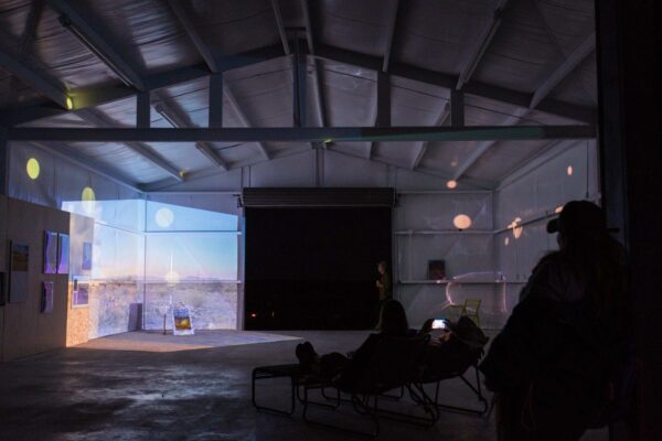 Visitors in an installation in a barn