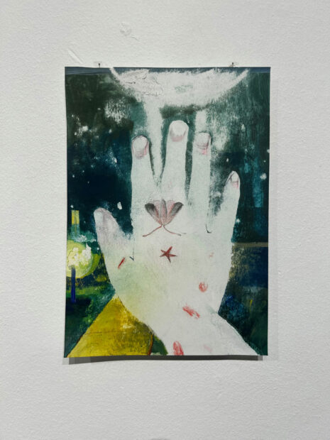 Painting of a hand on paper