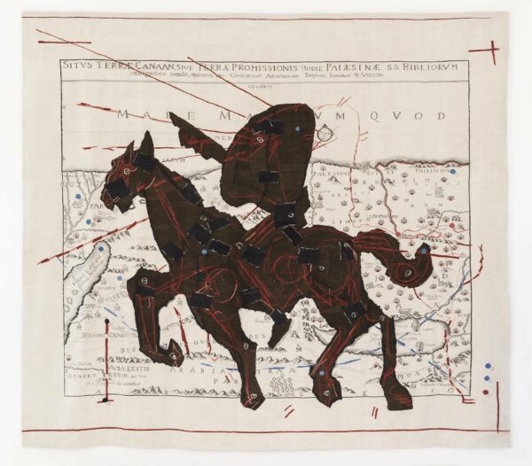 A textile work designed by William Kentridge of a silhouetted figure with a nose as a head riding a horse.