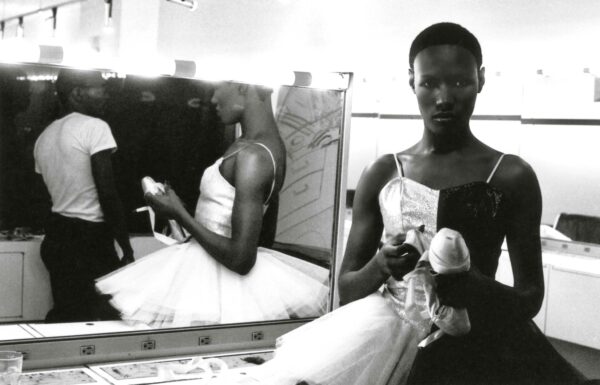 Black and white photo of a young Grace Jones in a tutu