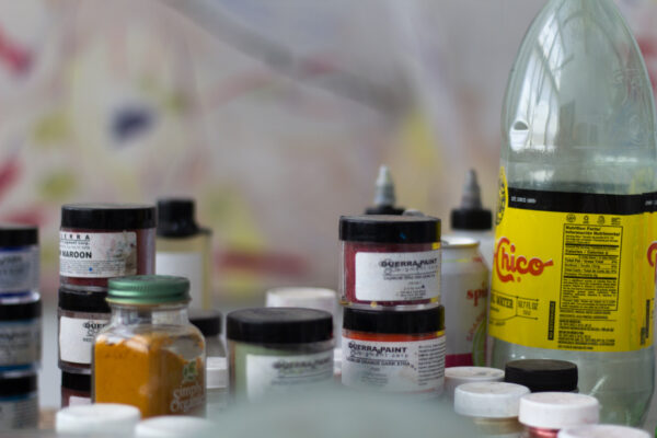 Jars of pigment sit in William Warden's studio at the Galveston Artist Residency