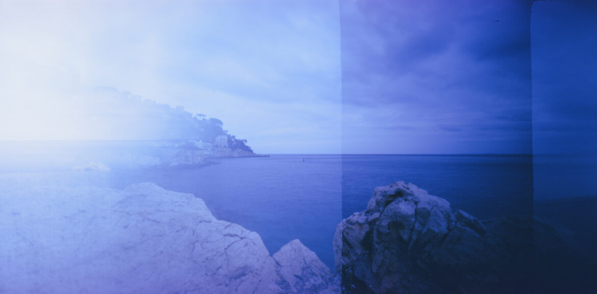 A double-exposure photograph of the Mediterranean Sea.