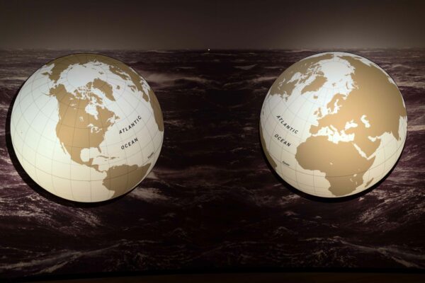 Photo of two cutouts of the globe