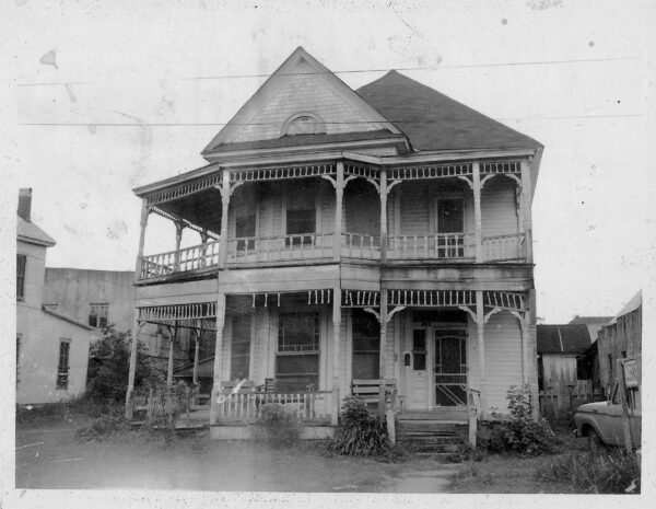 Antique photo of an old house