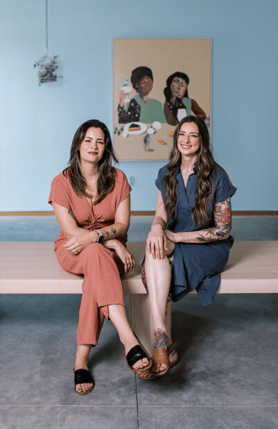 A photograph of artists Abbi Edmonson and Jessica Gutierrez.