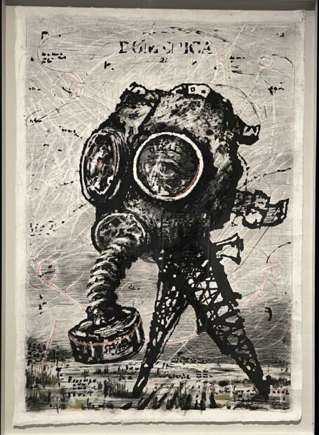 Work on paper of a head in a gas mask with tower legs