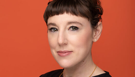 A photograph of curator Alex Klein.