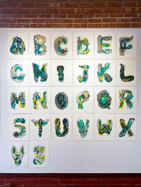 Floral paintings of letters on a wall